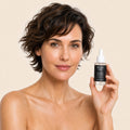aha-peeling-concentrate held by model