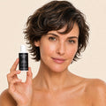 calming-eye-cream held by model