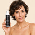 niacinamide-gel-moisturiser held by model
